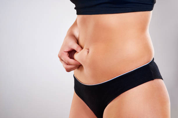 combattere la guerra contro il flab - liposuction foto e immagini stock