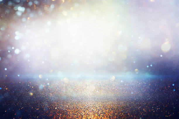 istock glitter vintage lights background. silver and blue. de-focused 1140909536