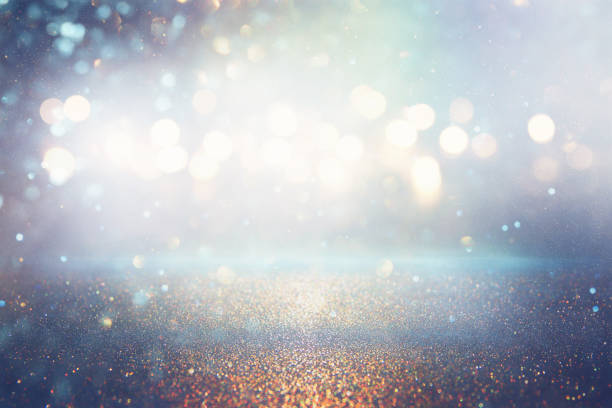 istock glitter vintage lights background. silver and blue. de-focused 1140909538