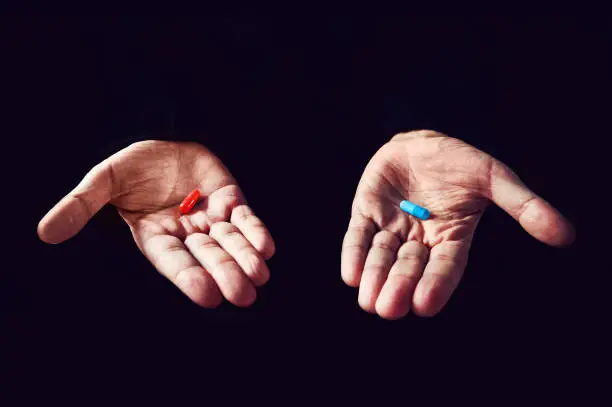 Red Pill Blue Pill concept. The right choice the concept of the movie matrix. The choice of tablets.
