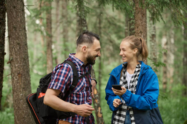 istock Couple hiking in the forest 1140926304