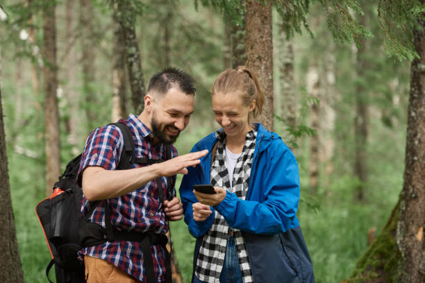 istock Couple hiking in the forest 1140926347