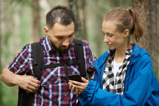 istock Couple hiking in the forest 1140926370