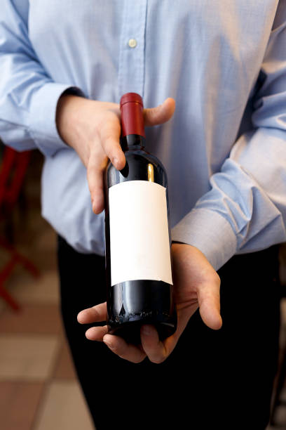 istock male sommelier is checking and testing red wine 1140927642