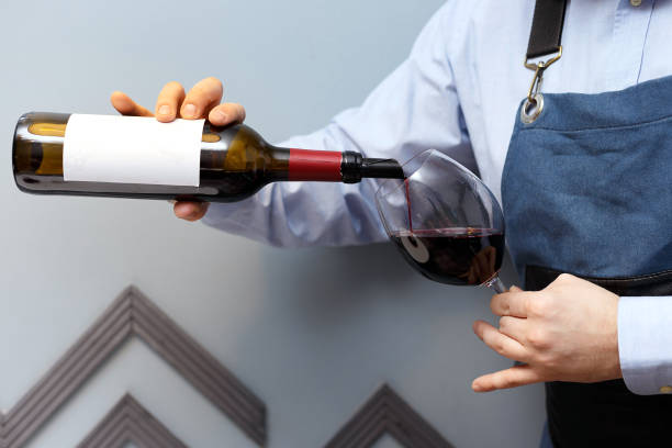 istock male sommelier is checking and testing red wine 1140927757