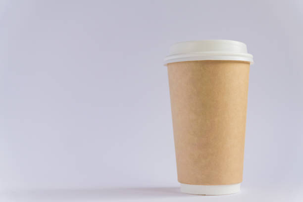 istock craft paper coffee cup. Coff to go on gray background 1140929424