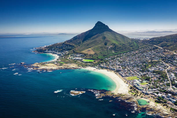 Camps Bay Lion's Head Aerial View Cape Town South Africa Aerial drone point of view over Camps Bay, the Camps Bay Beach towards Lion`s Head along the coast of Clifton, Clifton Beach and Sea Point on a sunny summer day. Cape Town, South Africa clifton stock pictures, royalty-free photos & images