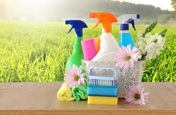 istock Spring cleaning concept with supplies on wooden table 1140934674