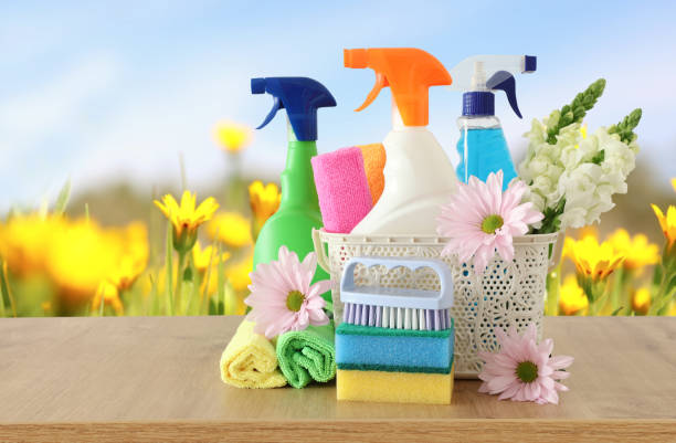 istock Spring cleaning concept with supplies on wooden table 1140934679