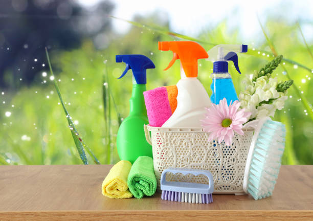 istock Spring cleaning concept with supplies on wooden table 1140934682