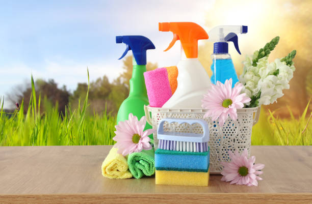 istock Spring cleaning concept with supplies on wooden table 1140934687