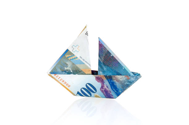 Paper currency boat among arrow charts