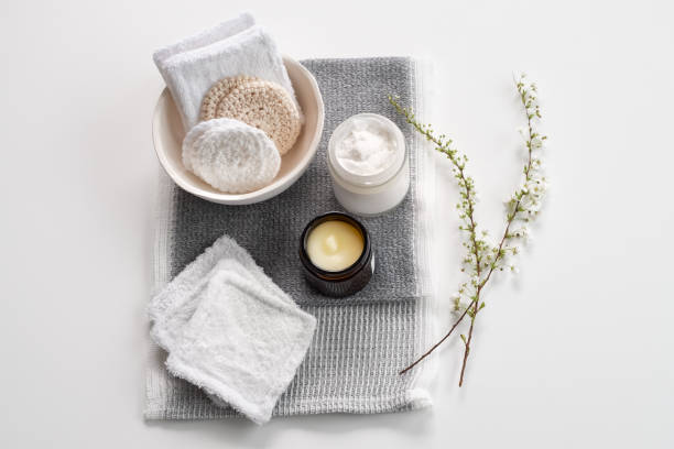 Hand Crafted Reusable Makeup Remover Pads, Natural Cleansers and Moisturizers Handmade, reusable makeup remover pads made from recycled towels and yarn scraps, charcoal infused towel, natural eye makeup remover balm and body butter. luxury craft stock pictures, royalty-free photos & images