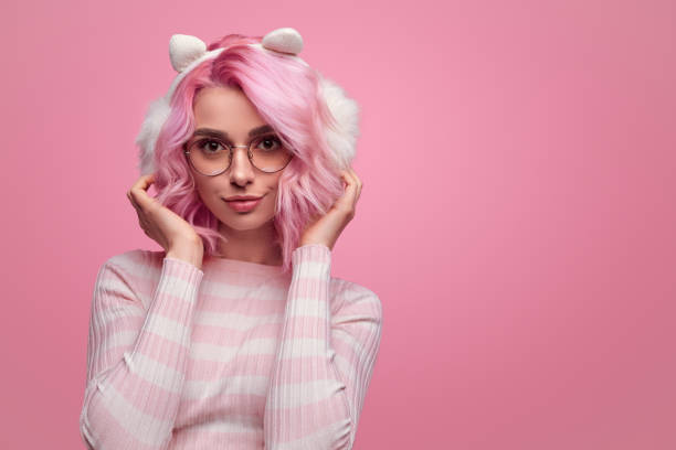 Charming hipster woman wearing earmuffs