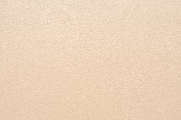 istock Full Frame Shot Of Beige Wall 1140944992