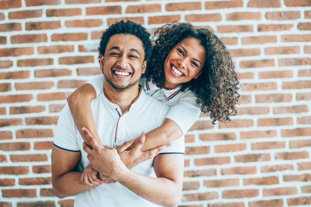 istock Young mixed race couple at home 1140948189