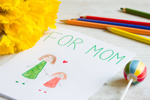 istock Happy mother's day drawing from a child for mom with greetings 1140948325