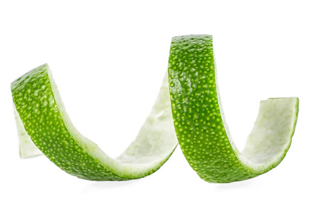 istock Fresh lime peel isolated on a white background. Lime twist. Lime skin. 1140949212