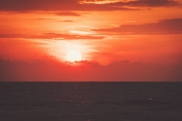 istock background of beach sunrise and sea waves 1140950185