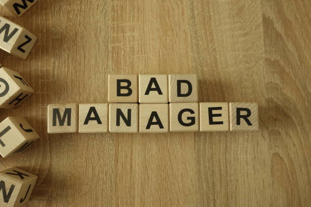istock Bad manager text from wooden blocks 1140952291