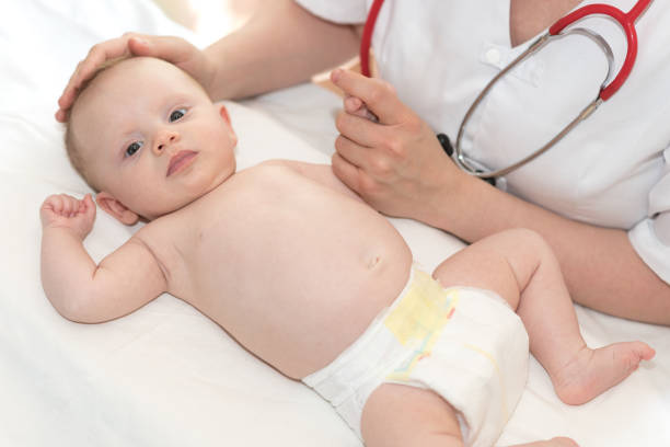 istock Pediatrician examining baby 1140952422