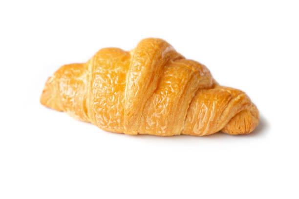 istock Croissant on isolated white background 1140954810