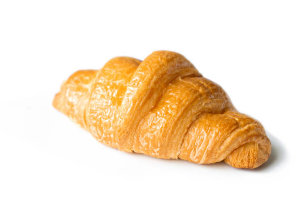 istock Croissant on isolated white background 1140954831