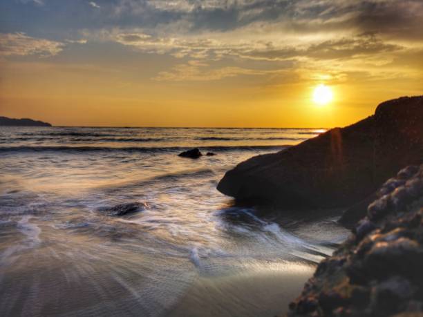 istock Beautiful silky-smooth water effects cascading over rocks, branches, and trees during the sunset fall. 1140955057
