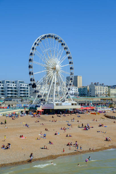 The Ferris Wheel Brighton East Sussex Looking towards the ferris wheel from Brighton pier, the wheel has since been  removed May 2016 brighton england stock pictures, royalty-free photos & images