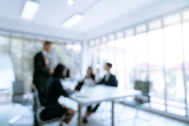 Defous blurry background business are present work in meeting with customer in office room stock photo