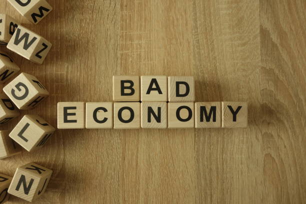 istock Bad economy text from wooden blocks 1140958542