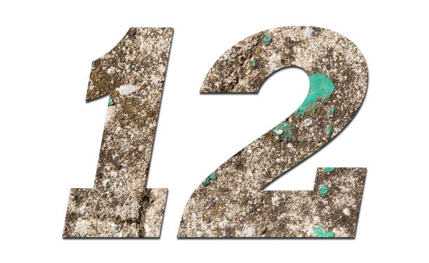 istock Number 12 with old wall on white background,Stone Number 1140958730