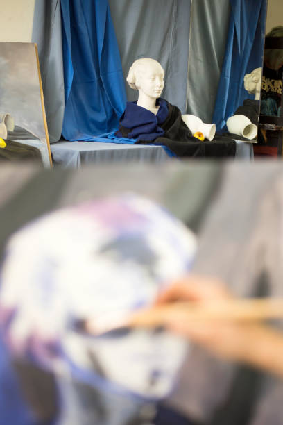 istock Young artists, students are painting in the studio. 1140958746