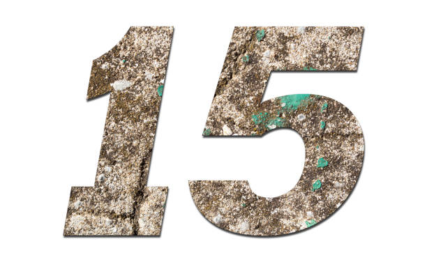 istock Number 15 with old wall on white background,Stone Number 1140959336