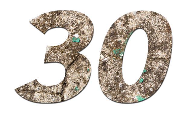 istock Number 30 with old wall on white background,Stone Number 1140960165
