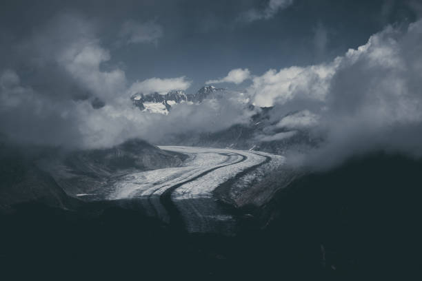 istock Panorama of mountains scene, walk through the great Aletsch Glacier 1140960242