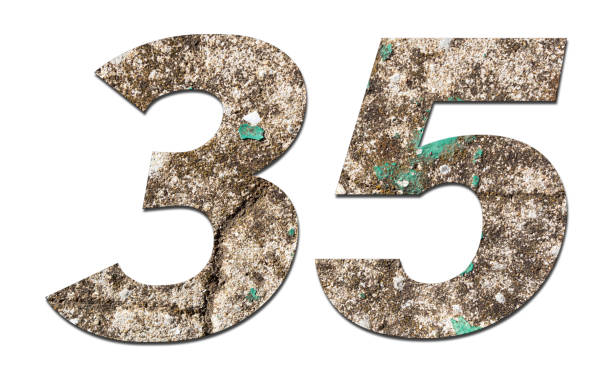 istock Number 35 with old wall on white background,Stone Number 1140960345