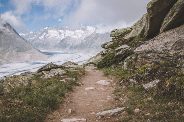 istock Panorama of mountains scene, walk through the great Aletsch Glacier 1140960872