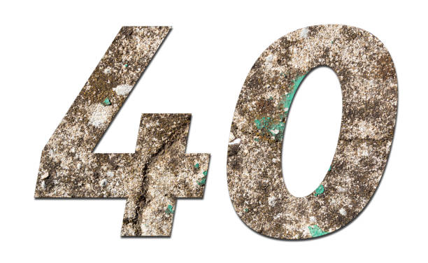 istock Number 40 with old wall on white background,Stone Number 1140960885