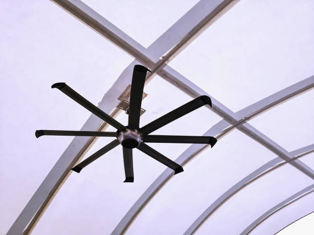 istock Electric Ceiling Fan Hanging Under Modern Roof Structure 1140961013