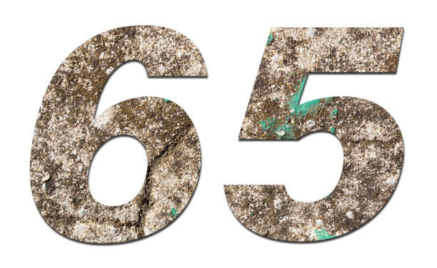 istock Number 65 with old wall on white background,Stone Number 1140961339
