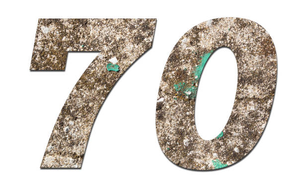 istock Number 70 with old wall on white background,Stone Number 1140961469