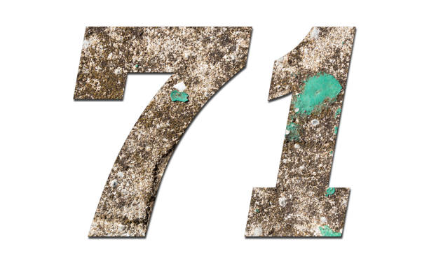 istock Number 71 with old wall on white background,Stone Number 1140961523