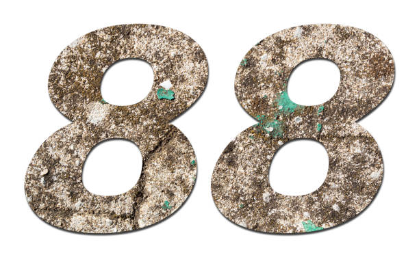 istock Number 88 with old wall on white background,Stone Number 1140962284