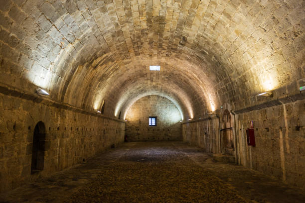 Inside view of the stone cellar and granary of the medieval castle of Peñíscola, Comunidad Valenciana, Spain.