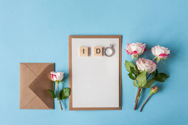 istock Wooden letters spelling I do with engagement ring. 1140964934