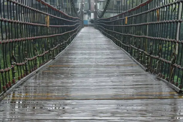 old hanging bridge cross river in Shifen Taiwan