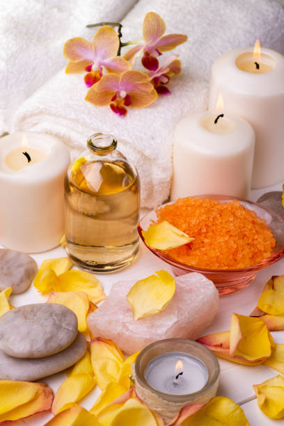 istock Spa still life, rose petals with bath salts and perfumed essences 1140967701