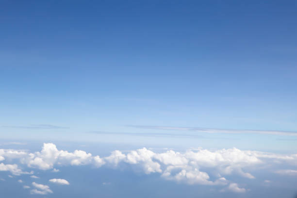istock Dramatic atmosphere panorama view of beautiful blue sky and soft white clouds from aircraft. 1140969879