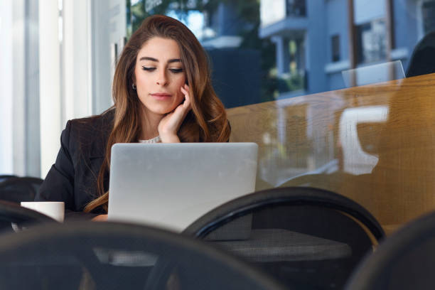 istock Successful businesswoman working at cafe 1140973637